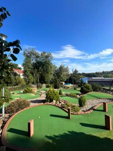 a view of a golf course with a green at Apartmány u golfu in Jihlava