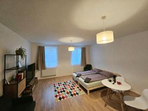 Posteľ alebo postele v izbe v ubytovaní Apartmány Svitavy