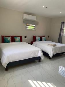 Postel nebo postele na pokoji v ubytování Boca Simon Vacation Curacao