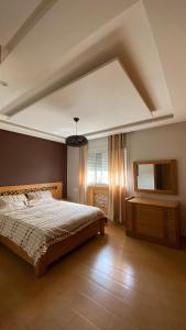 Postelja oz. postelje v sobi nastanitve Villa de luxe centrale Harhoura