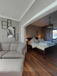 Ліжко або ліжка в номері Maries bunte Villa