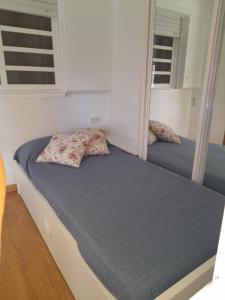 Posteľ alebo postele v izbe v ubytovaní Benidorm