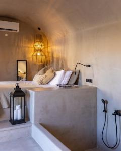 A bed or beds in a room at EliteDIMension Chalki