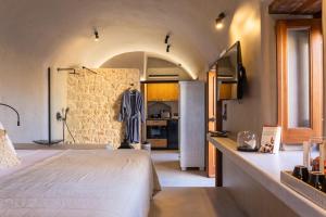 A bed or beds in a room at EliteDIMension Chalki