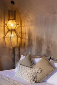 A bed or beds in a room at EliteDIMension Chalki
