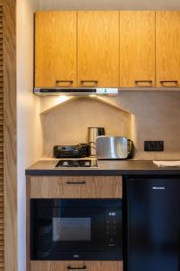 A kitchen or kitchenette at EliteDIMension Chalki