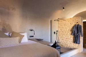 A bed or beds in a room at EliteDIMension Chalki