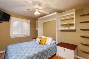 En eller flere senge i et værelse på Rhythms of Tom Tom Sparkling Pool + 7 billeder