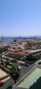 a view of a city with a parking lot at Vista triangular in Las Palmas de Gran Canaria