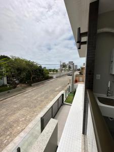a view of a street from a building at Conchas das Caravelas in Governador Celso Ramos