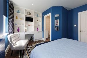 Televiisor ja/või meelelahutuskeskus majutusasutuses The Eagles