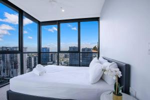 Katil atau katil-katil dalam bilik di Soaring Skyline on Southside at Resort-Style Stay +15 gambar