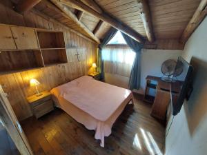 Ένα ή περισσότερα κρεβάτια σε δωμάτιο στο Buena vibra