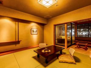 Postel nebo postele na pokoji v ubytování Ooedo Onsen Monogatari Terunoyu