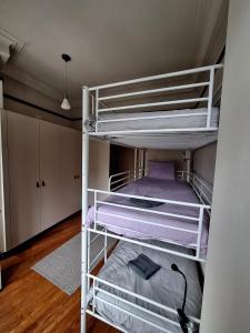 a couple of bunk beds in a room at Easy Host Porto in Porto