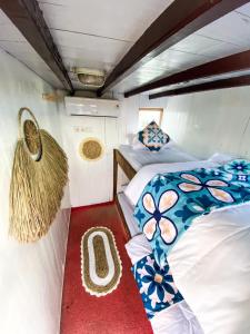 Postel nebo postele na pokoji v ubytování Boats Open Trip Komodo 3D2N