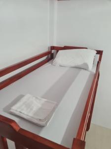 Postel nebo postele na pokoji v ubytování Rotunda Inn home stay
