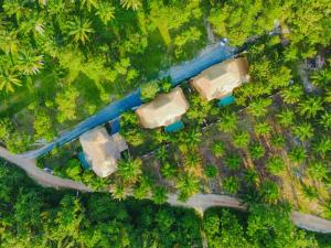 an overhead view of a house and a road and trees at Aloe Ecological Boutique Villa 2 in Ao Nam Mao