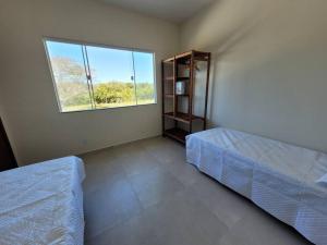 Postel nebo postele na pokoji v ubytování Casa de Praia - Búzios + 26 fotografií