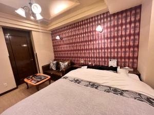 Lova arba lovos apgyvendinimo įstaigoje Hotel Crystal Gate Nagoya - Couple Hotel