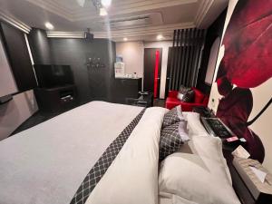 Lova arba lovos apgyvendinimo įstaigoje Hotel Crystal Gate Nagoya - Couple Hotel