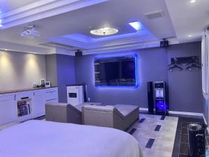 a room with a bed and a tv in a room at Hotel Crystal Gate Nagoya - Adult Only in Nagoya