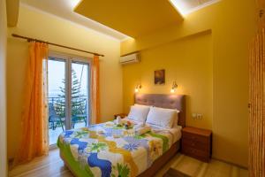 Ένα ή περισσότερα κρεβάτια σε δωμάτιο στο Butterfly Appartments