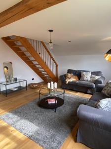 Posezení v ubytování Allgäu Cottage - traumhafter Blick in die Schweizer Berge