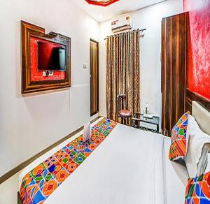 Postel nebo postele na pokoji v ubytování Fabhotel Glorify Palace - Nr Mumbai International Airport
