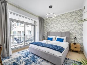 Ένα ή περισσότερα κρεβάτια σε δωμάτιο στο Incredible Studio In Burj View