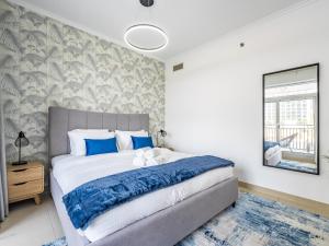 Ένα ή περισσότερα κρεβάτια σε δωμάτιο στο Incredible Studio In Burj View