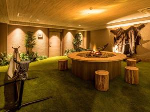 Posezení v ubytování Ooedo Onsen Monogatari Premium Toba Saichoraku