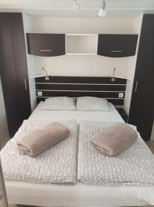 Posteľ alebo postele v izbe v ubytovaní u la la home