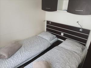 Posteľ alebo postele v izbe v ubytovaní u la la home