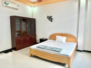 Posteľ alebo postele v izbe v ubytovaní Nhà nghỉ Hải Đăng - Hai Dang Hotel