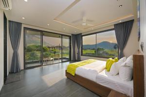 Postel nebo postele na pokoji v ubytování Jalsa Villas Phase 2