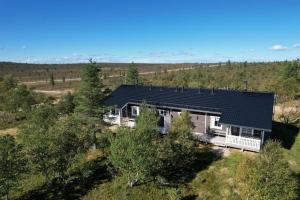 an overhead view of a house with a roof at Twin Peaks Urupää B Saariselkä in Saariselka