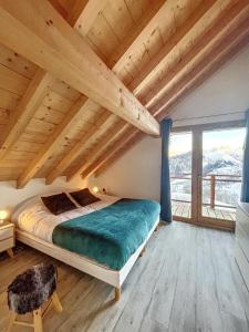 מיטה או מיטות בחדר ב-Chalet Le Vallonnet