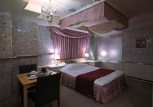 Postel nebo postele na pokoji v ubytování Hotel Mio Seki Adult Only + 9 fotografií