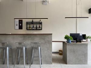 Kuchyň nebo kuchyňský kout v ubytování Pomelo Hostel Xingping