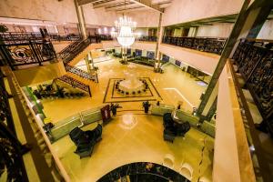 an overhead view of a shopping mall with a chandelier at 慧兰酒店bodhi hotel 