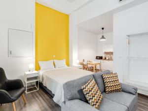 A bed or beds in a room at Kula apartments City center Exarchia