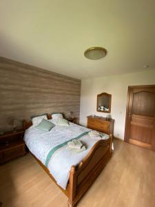 Postel nebo postele na pokoji v ubytování Le Logis du Plateau