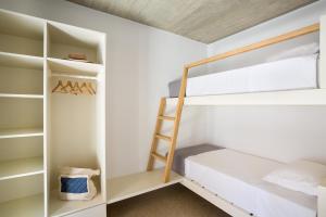 Postel nebo postele na pokoji v ubytování Flaros Village