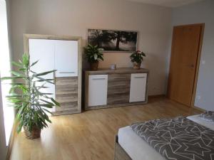 Ένα ή περισσότερα κρεβάτια σε δωμάτιο στο Fewo 1 - Osterberg