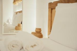Posteľ alebo postele v izbe v ubytovaní San Michele Luxury Rooms