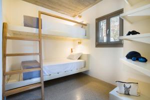 Postel nebo postele na pokoji v ubytování Flaros Village