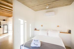 Postel nebo postele na pokoji v ubytování Flaros Village
