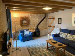 Zona de estar de Stunning rural gem with pool in southwest France
