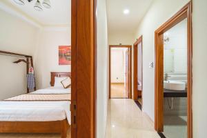 Postel nebo postele na pokoji v ubytování Dieu Thong Hotel